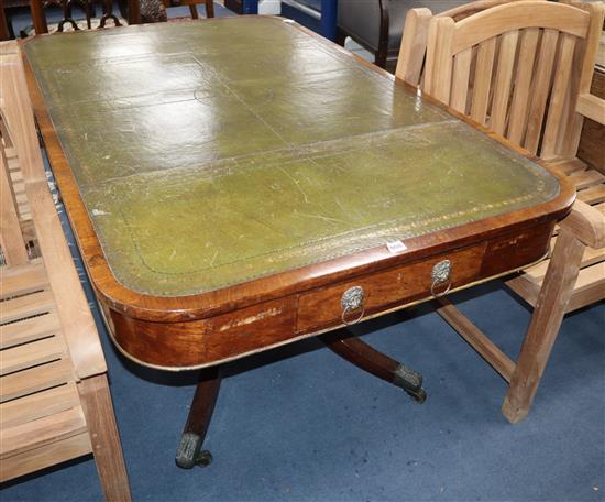 A Regency mahogany library table, with green gilt tooled leather inset top, on splayed legs Length 150cm